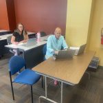 Kentucky Career Center participants Heather and Larry receiving their Badges of Completion during an Intergenerational Tech Inc. workforce upskilling class.